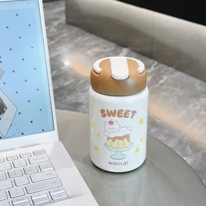 Detail shot of cute mini insulated water bottle with bear cartoon design and brown cap.