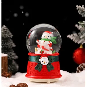 Details of the Christmas luminous snow globe music box, cute snowman inside, ideal holiday gift.