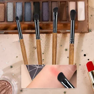 Wooden handle eyeshadow makeup brush set detail view showing soft bristles and powder blending.