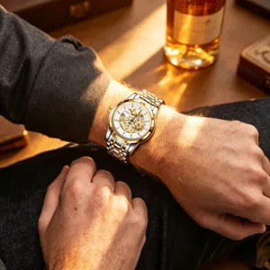 Luxury men automatic mechanical watch with skeleton dial and two tone steel strap stylish design.