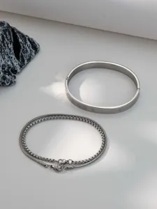 Stainless steel Roman numeral bangle and layered chain bracelet set, niche high-end fashion.
