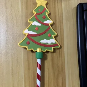 Christmas tree 3D printed magic wand credit card checkout prop, festive party supply tool.