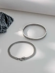 Stainless steel Roman numeral cuff bracelet and chain bracelet set detail view.