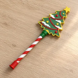 Christmas tree magic wand detail view, red and white candy cane handle, festive party prop.