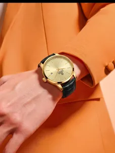 Élégante montre homme dorée avec bracelet en cuir noir montre-bracelet casual pour le style