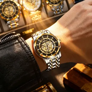 Luxury automatic mechanical watch for men with skeleton dial and two-tone steel bracelet.