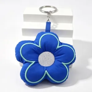 Blue padded flower keychain with light blue piping and metal ring for cute bag accessories