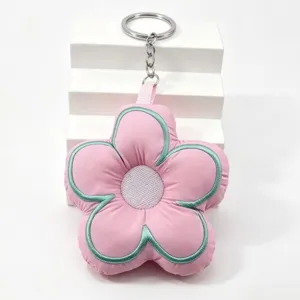 Pink padded flower keychain with green embroidery, cute fabric plush bag charm and key ring.