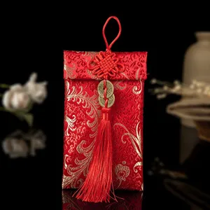 Traditioneller chinesischer Brokat Roter Umschlag Geldbeutel mit Quaste und Münze