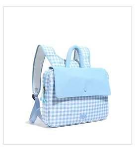 Blue and white plaid laptop backpack detail shot, showing front flap and handle design.