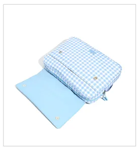 Light blue gingham laptop bag with flap and zipper, stylish student computer sleeve.