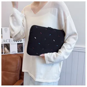 Black laptop sleeve with colorful embroidery stitches, protective tablet bag for 13 15.