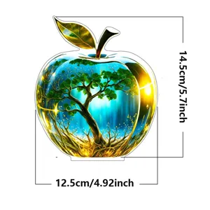 Crystal apple ornament with internal tree design, ideal desktop decor for home gifts.