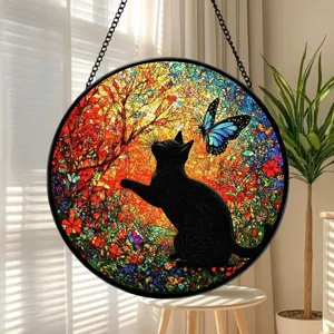Stained glass window hanging featuring a black cat and blue butterfly design with vibrant colors.