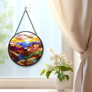 Stained glass hanging suncatcher panel featuring a colorful scenic mountain landscape design.