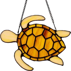 Stained glass sea turtle suncatcher detail, colorful window hanging decor for home.
