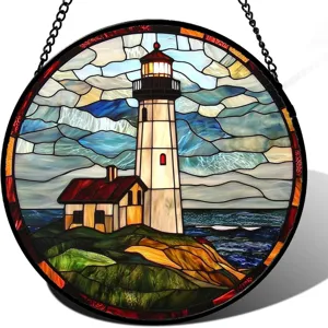 Detailed shot of round stained glass style lighthouse hanging suncatcher with metal chain.