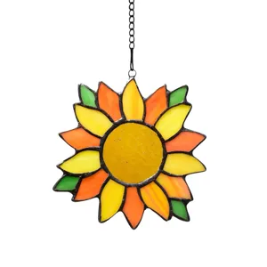 Detailed close-up of a colorful stained glass sunflower suncatcher hanging ornament with chain.