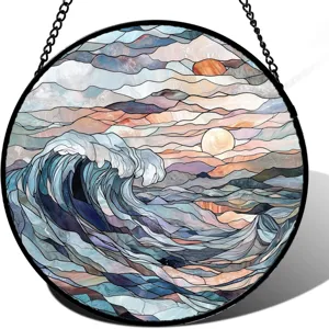 Acrylic suncatcher window hanging featuring colorful ocean wave and sunset design.