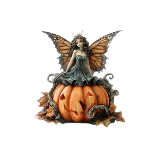 Halloween fairy figurine with butterfly wings and carved pumpkin decor for autumn home decoration.