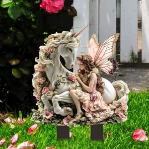 Close-up detail of the pink fairy and unicorn acrylic garden stake, wonderful outdoor decor.