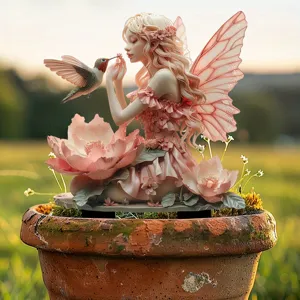 Bohemian acrylic garden stake featuring a detailed fairy and hummingbird design for outdoor decor.