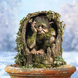 Close-up detail of the mossy tree stump troll acrylic garden insert, perfect for flower pots.