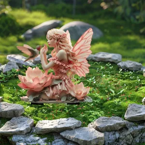 Enchanting fairy and hummingbird garden stake, pink floral acrylic outdoor yard decor detail.