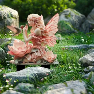 Detailed view of the bohemian acrylic fairy and hummingbird garden stake, perfect for outdoor lawn decor.
