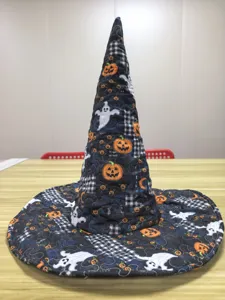 Quilted Halloween witch hat detail showcasing ghostly pumpkin print and fine stitching craftsmanship.