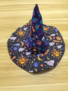 Halloween witch hat featuring digital print and quilting craft, perfect for party wear.
