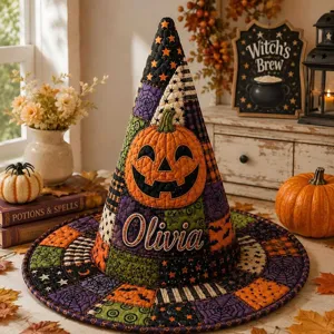 Detailed view of quilted Halloween witch hat with pumpkin embroidery and custom name display.
