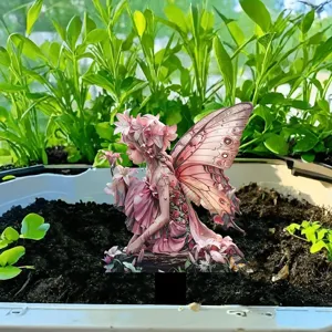Detailed view of colorful fairy garden stake in soil pot, waterproof outdoor decor ornament.