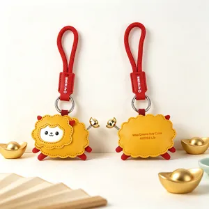Cute leather sheep keychain with red strap and gold ingot charm for car decor and new year gift.