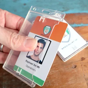 Transparent hard plastic ID badge card holder featuring convenient thumb slot detail display