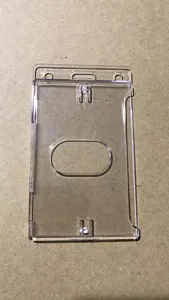 Clear hard plastic card holder ID badge protector with thumb slot for office and school use
