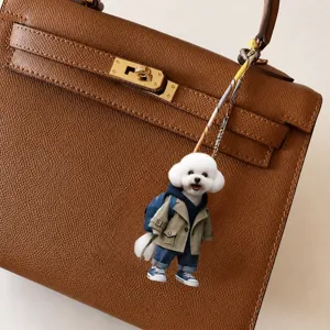 Cute acrylic dog backpack pendant detailed view, fashionable car hanging ornament and bag charm.