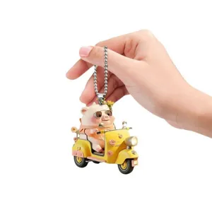 Cute cartoon pig acrylic keychain pendant detail view, perfect for car interior or bag decor.