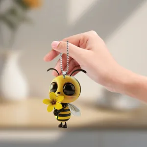 Cute cartoon bee acrylic hanging ornament keychain, detailed view of the cute bee with flower.
