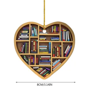 Heart-shaped acrylic bookshelf hanging ornament with miniature book design for car decor.