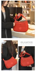 Multi-pocket casual nylon shoulder bag, large capacity crossbody bag for women's daily use.