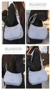 Multi-pocket nylon crossbody bag for women, casual lightweight shoulder bag with strap.