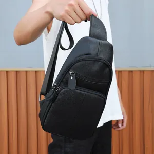 Men black leather chest bag detail, casual crossbody sling bag with multiple zippers.