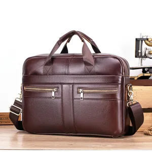 Close-up of premium dark brown leather business briefcase with dual zipper pockets and durable hardware.