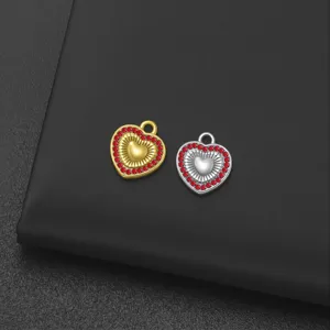 Colgante corazón de acero inoxidable accesorio joyeria DIY con estrás rojos oro y plata.