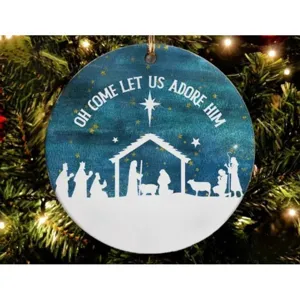Round acrylic Christmas tree hanging ornament with Nativity scene printed for holiday decor