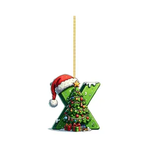Closeup detail of the letter X Christmas tree hanging ornament with cute holiday decorations.