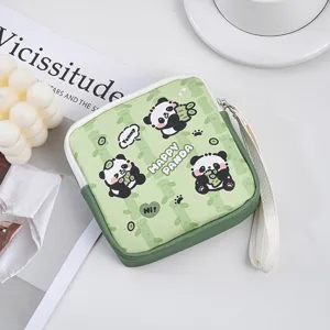 Detailed close-up of a cute green panda print canvas coin purse with a handy wrist strap.