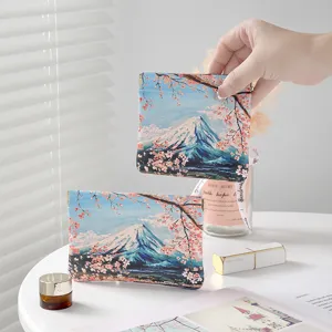 Portable cosmetic bag with Mt. Fuji and cherry blossom print. Cute mini storage pouch.