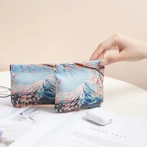 Portable cosmetic bag with Japanese Fuji mountain cherry blossom print, mini makeup storage pouch.